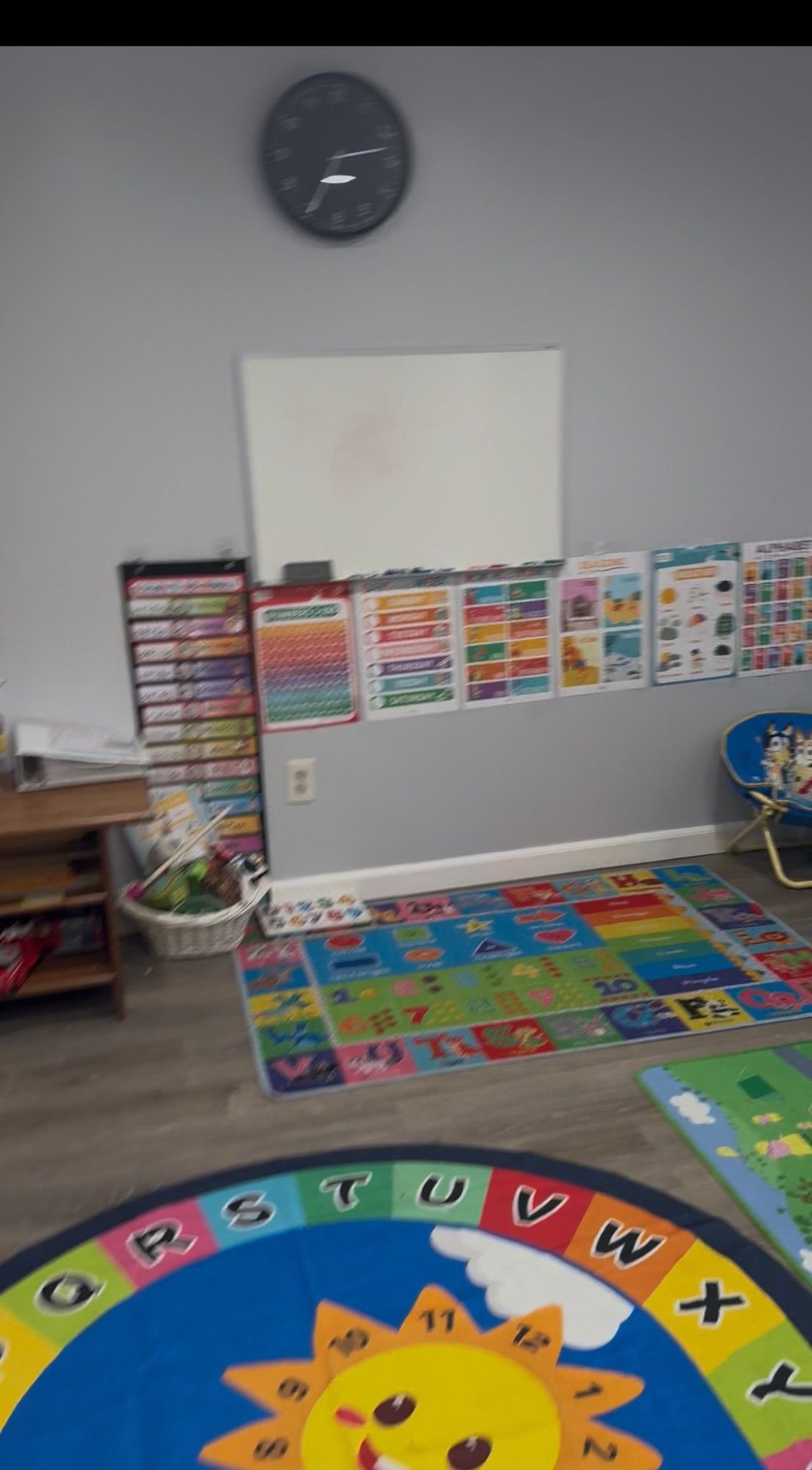 Activity area with educational charts and learning aids